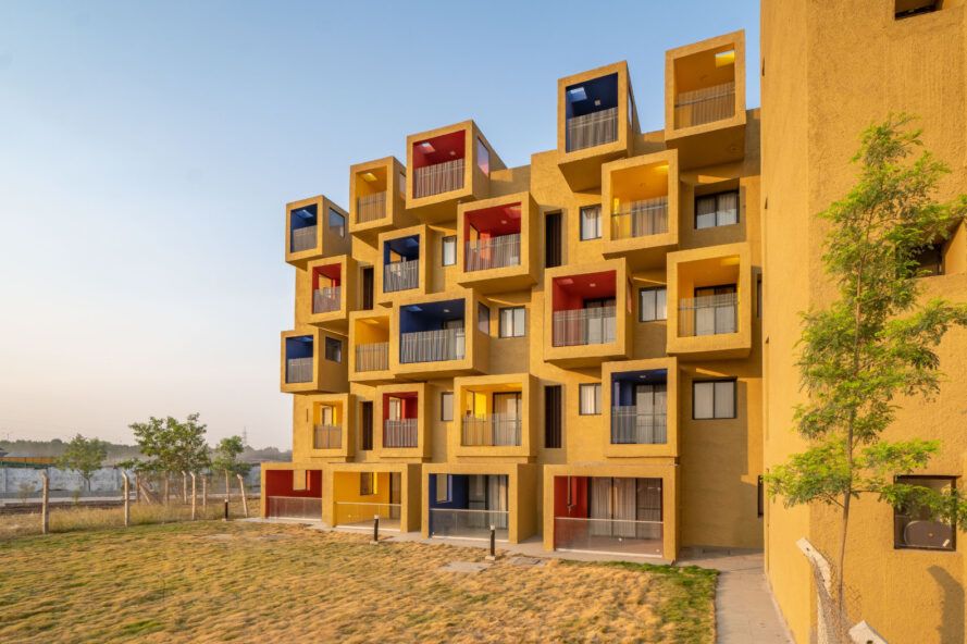 Sustainable housing complex features amazing bursts of color