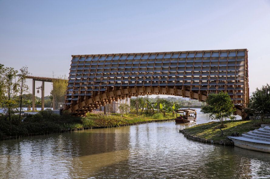 Timber bridge connects a city with its fishing village
