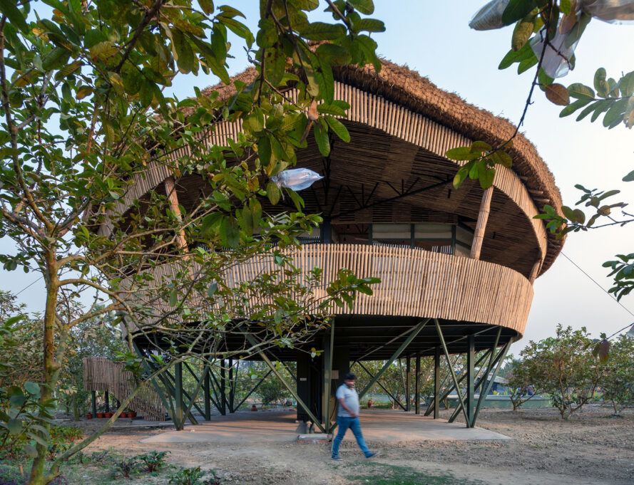 Bamboo home in India overlooks an impressive farm